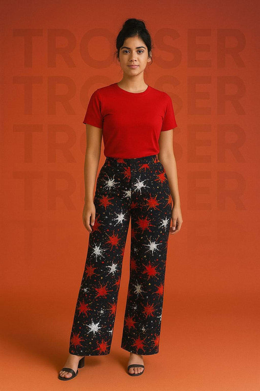 Cosmic Flame Starburst Palazzo Pants – Black Wide-Leg Trousers with Red & White Splatter Print